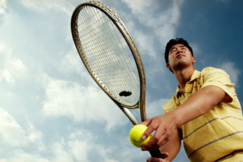 picture of man playing tennis